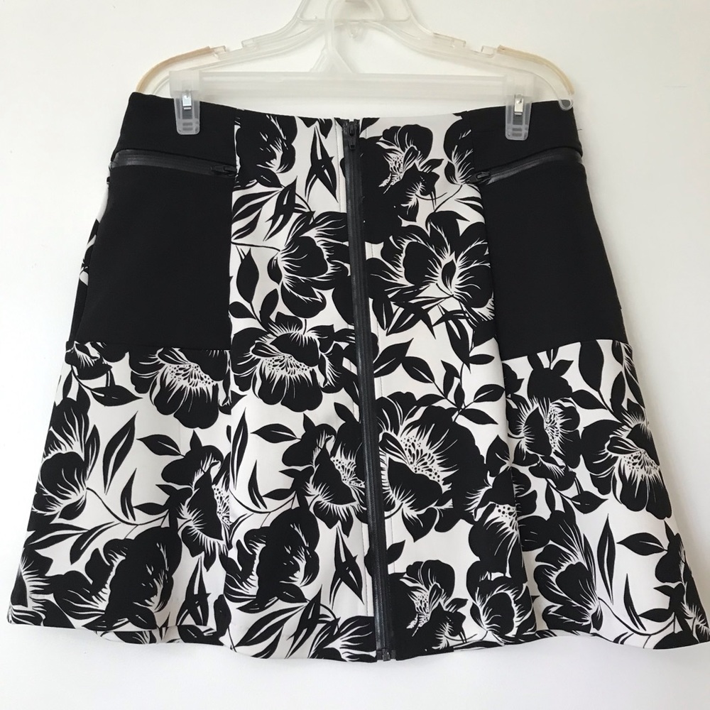 Worthington skirts white background with black flowers. Size 12P. Almost new.